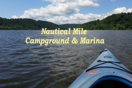 Nautical Mile Campground & Marina Logo
